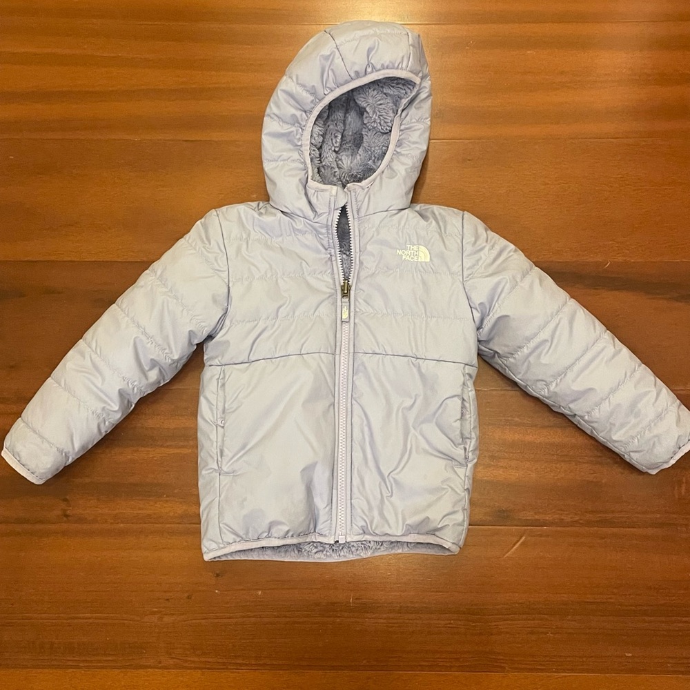 Toddler North Face reversible nylon/fleece hooded jacket in lavender.